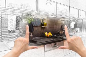 Hands framing kitchen design concept